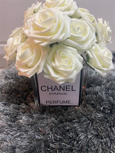 chanel camelia branding|chanel vase with flowers.